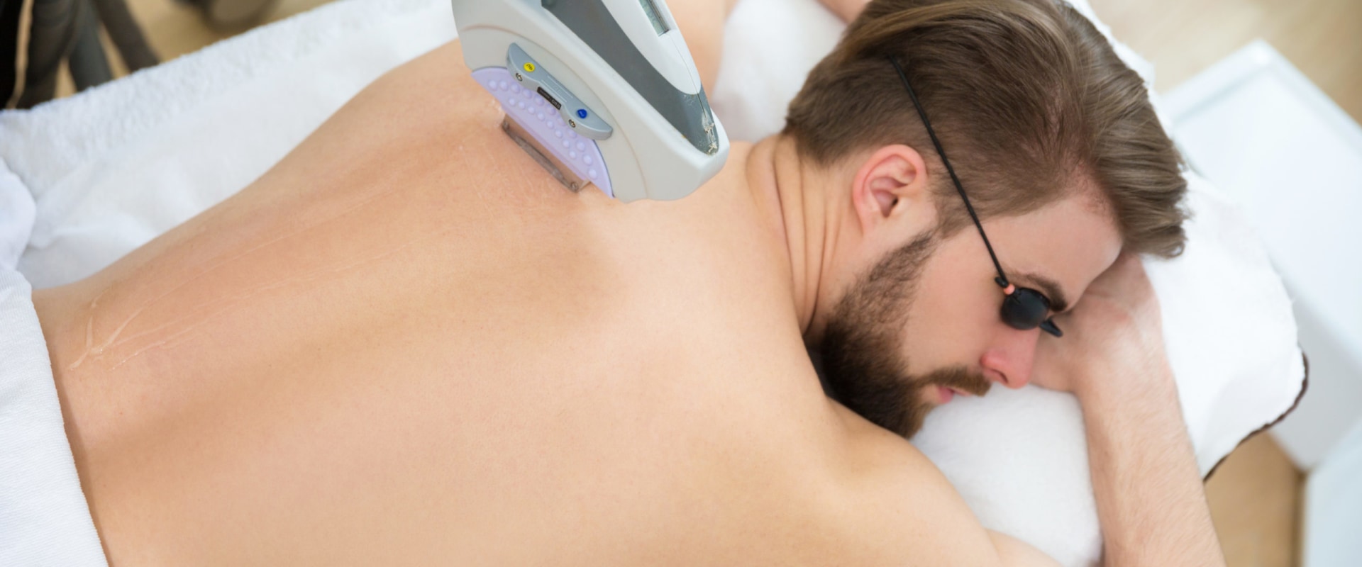 Can I Get Laser Hair Removal if I Have Tattoos or Piercings in the Area Being Treated?